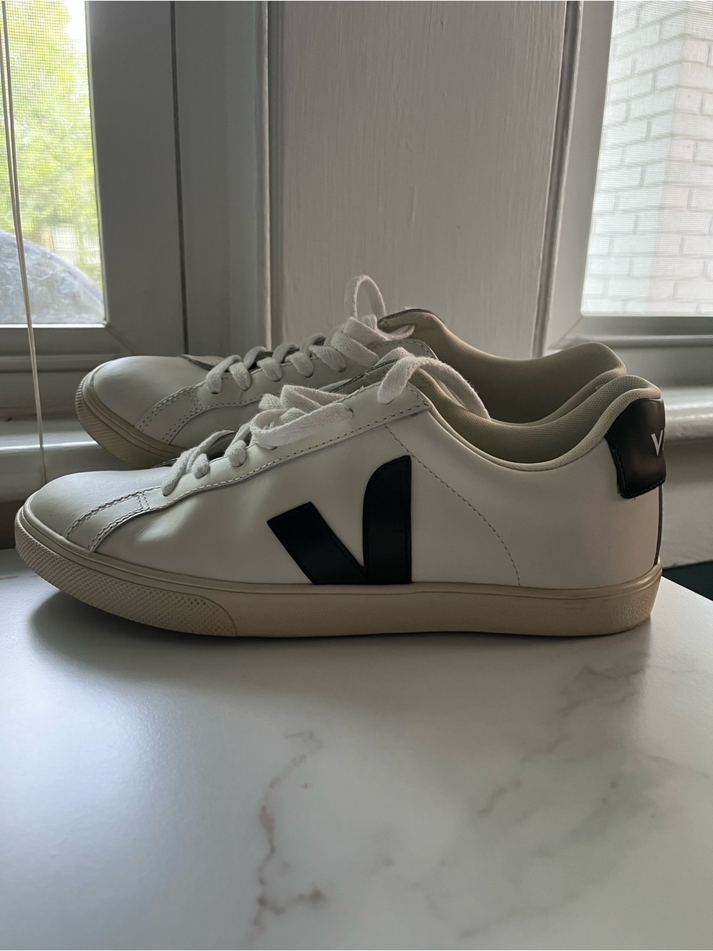 Veja woman’sWhite Sneakers with Black Heel Tab